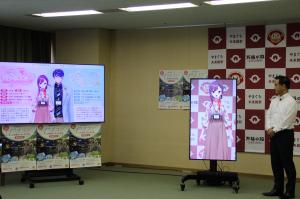 歓談する村岡知事の写真